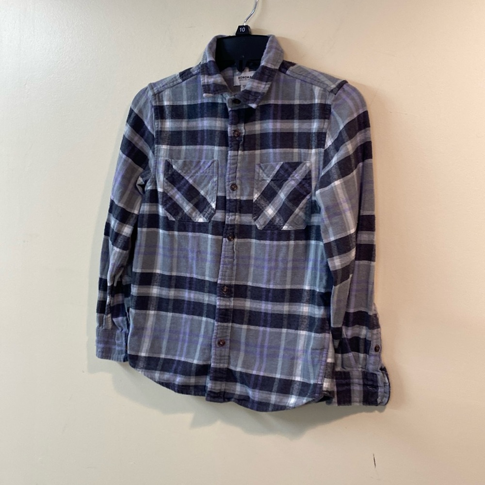 2 boys plaid shirts Overdrive Sherpa and Sonom M. L.